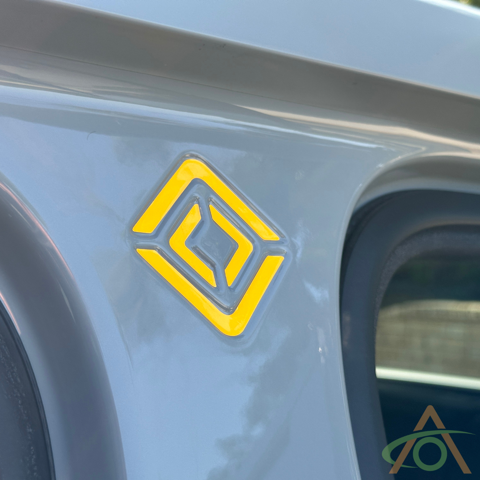 Yellow vinyl insert for B-Pillar Rivian logo