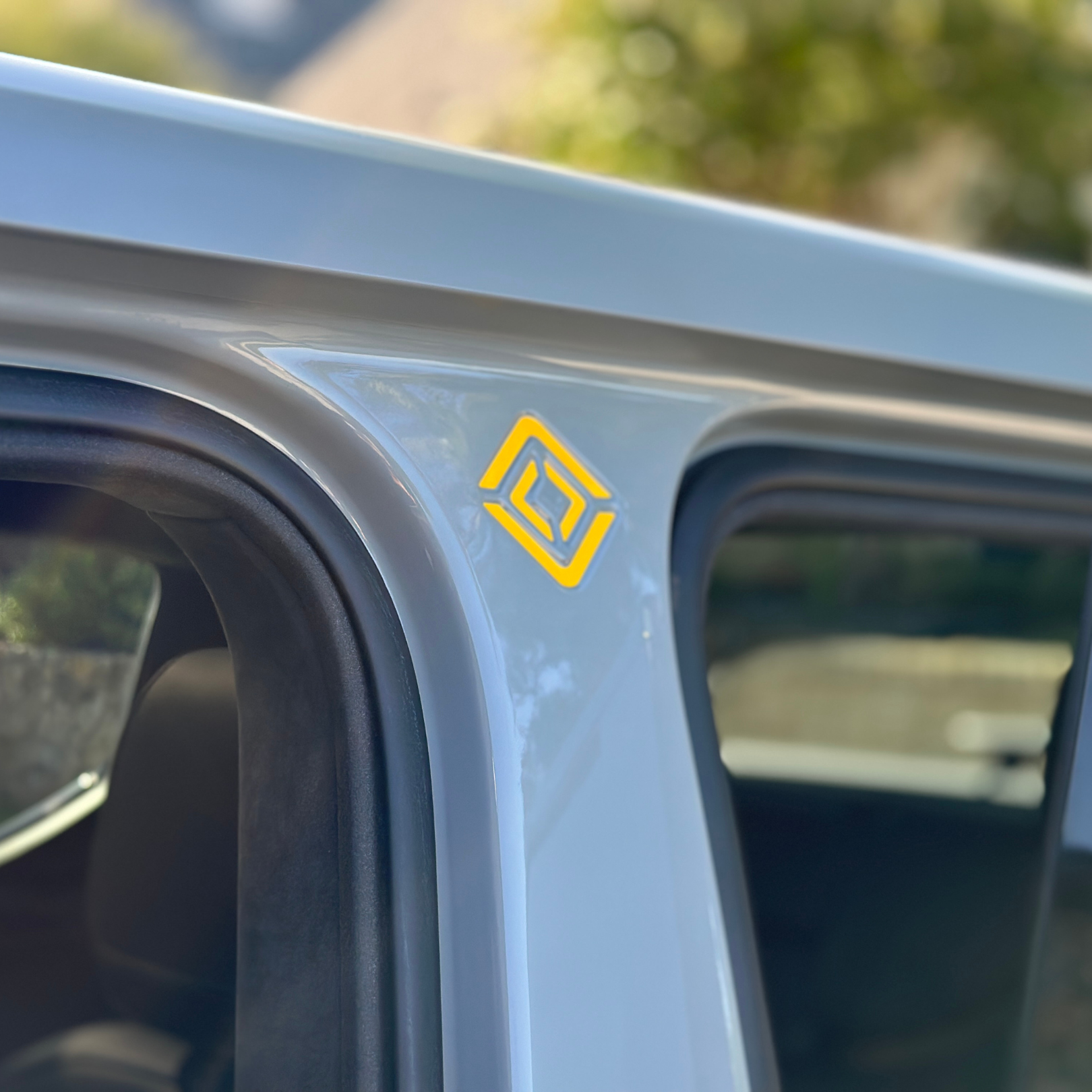 Yellow vinyl insert for B-Pillar Rivian logo