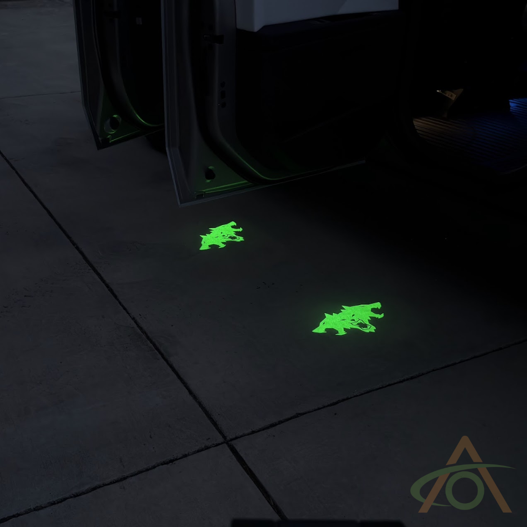 Size Reference showing the Green Beast puddle light for Cybertruck