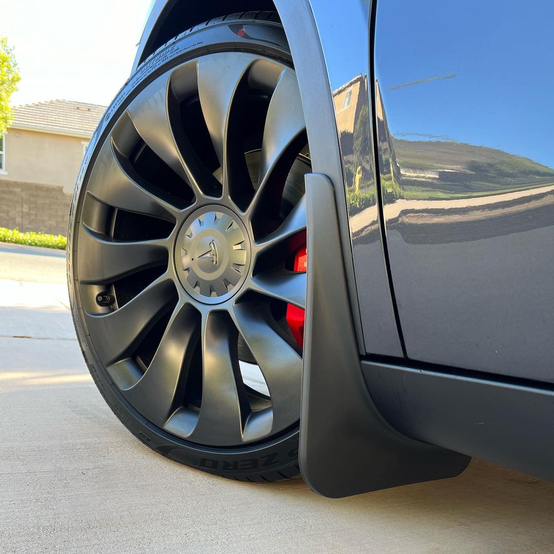 Model Y Mud Flap on Grey with Performance Wheel