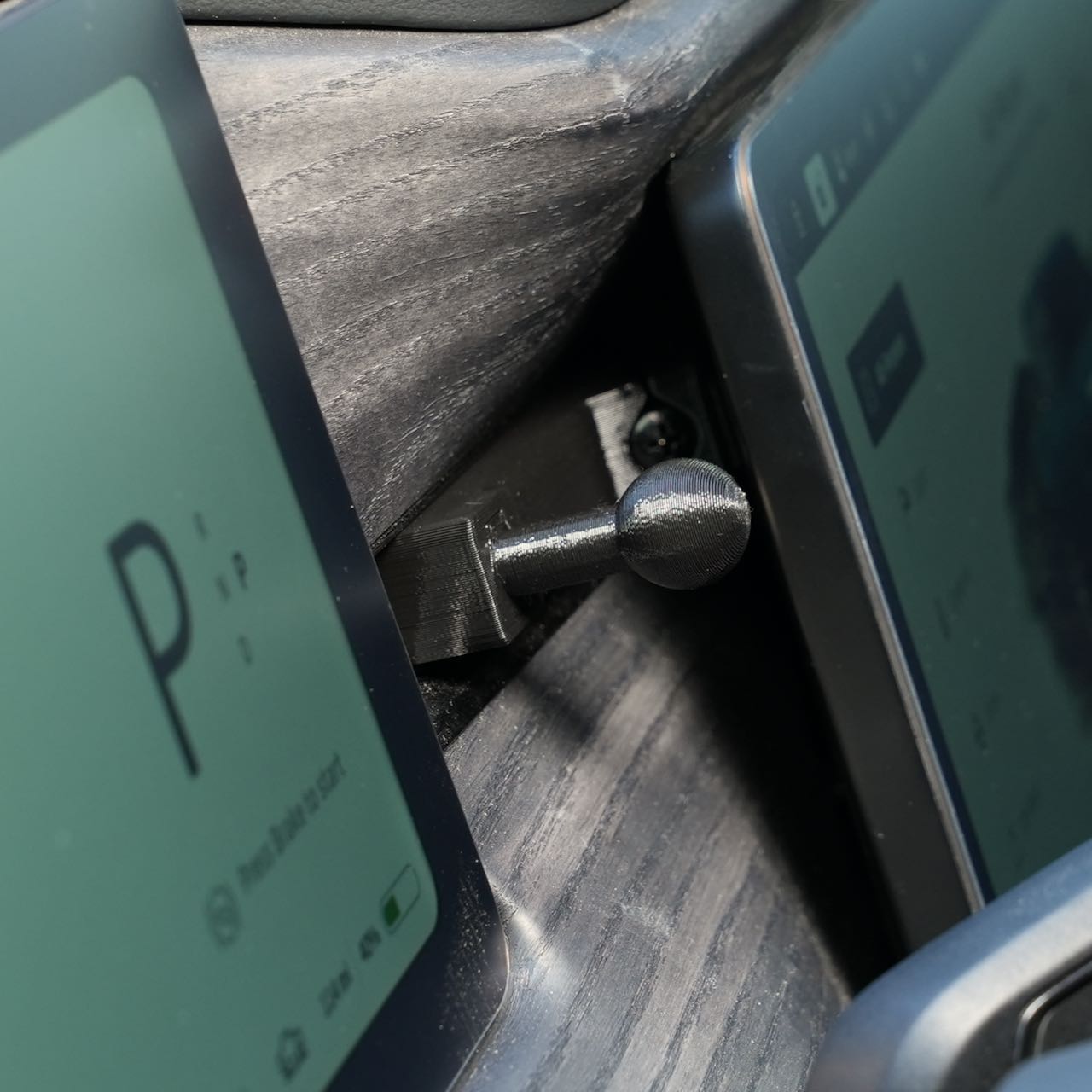 Close-up of the Magsafe phone mount for Rivian R1T & R1S