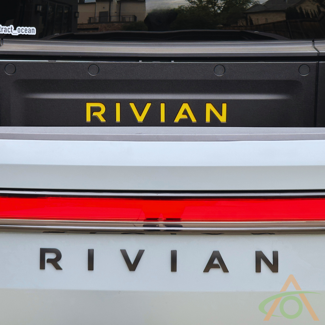 Rear emblem for R1T & R1S in satin black (also showing our trunk bed decal)