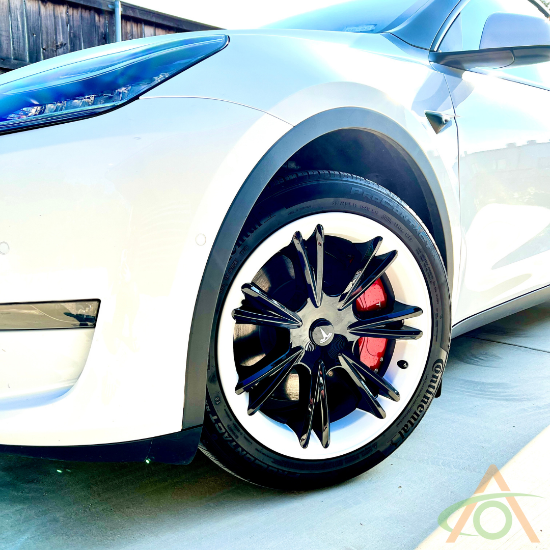Glossy black & white wheel covers for Tesla Model Y